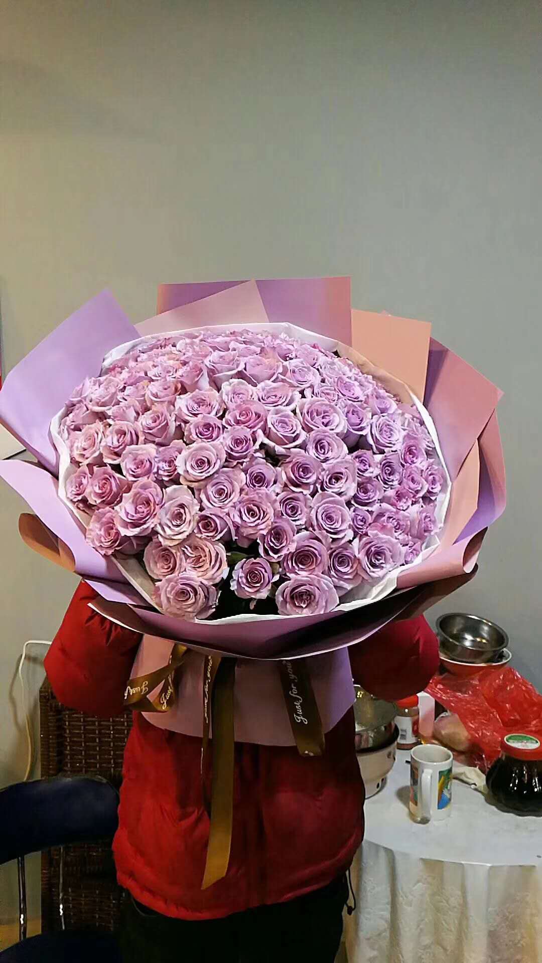 send 66 purple roses to 